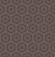 Geometric repeating ornament with hexagonal dotted golden elements. Seamless abstract modern pattern