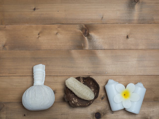 Aromatherapy  product  Spa set ,candle ,soap,coconut,flower,shell,  massage  with wood    background .