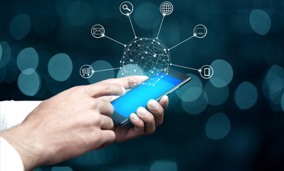 Hands holding phone with circle global network connection