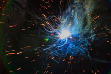 SMAW &ndash; Shielded metal arc welding and welding fumes closeup.