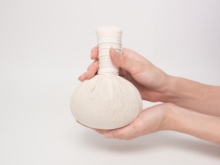 Aromatherapy  product  Spa massage set  hold by hand   with white background .