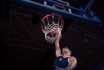 basketball player, low angle view, slam dunk