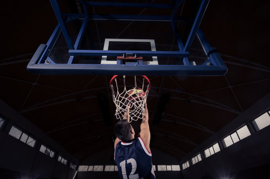 basketball player, slam dunk, rear view, back