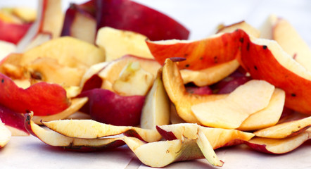 Red Apple Peeling with white background, close up shot