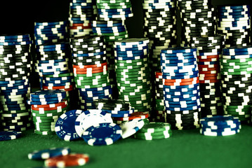 Fototapeta premium Casino Concept background with dice, roulette and chips. in montion