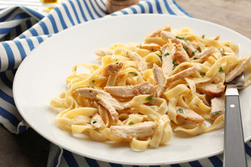 Plate with delicious Chicken Alfredo, closeup