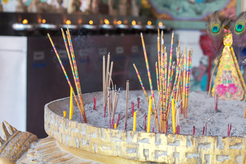 Fototapeta premium Chinese Incense stick in a pot