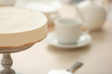 Delicious cheesecake on stand