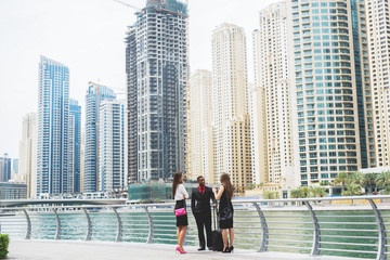 Panoramic city scape multiracial group of business people standing.