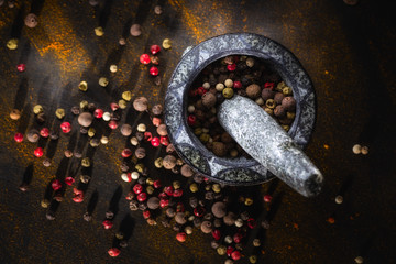 stone mortar and pestle with pepper chalk board