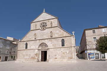 Fototapeta na wymiar A Medieval church on a square in Rab, Croatia