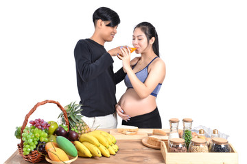 Pregnant women drink orange for baby health.