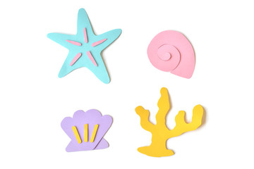 Seashells and starfish paper cut on white background - isolated