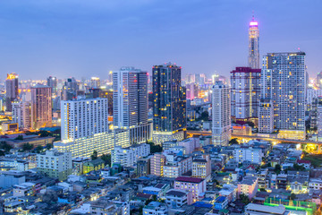 Naklejka premium Bangkok City skyline aerial view at night time and skyscrapers of midtown bangkok.