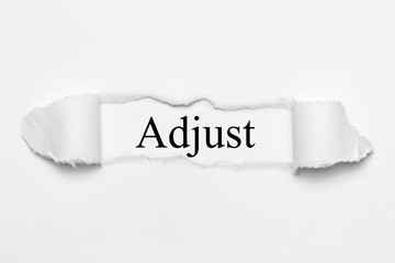 Adjust on white torn paper