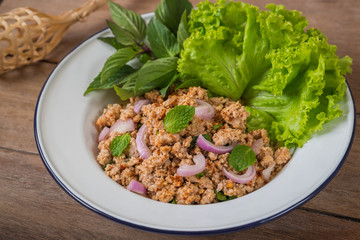 Spicy minced pork salad with vegetables, Thai food