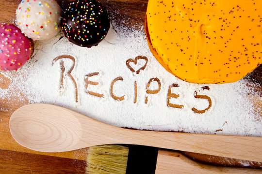 Recipes with cakes - hand written in flour
