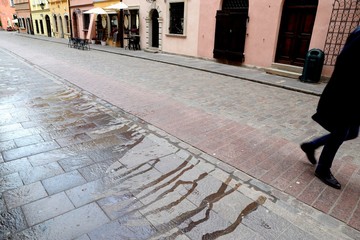broke pavement on a cobbled street in the Old Town in Warsaw