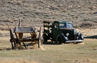 Wreck of cart and pick up in the ghost town of Bodie - California