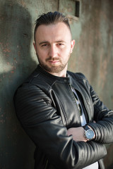 young man in leather jacket 