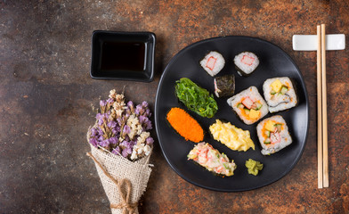 Mix sushi on old brown rust background