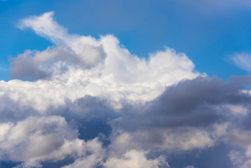 Blue sky with gray clouds