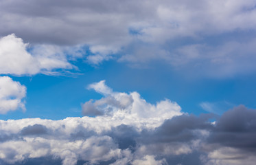 Obraz premium Blue sky with gray clouds