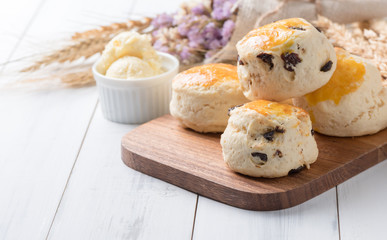 scones on wood block with barley,