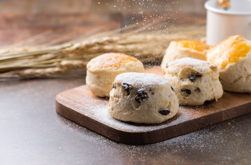 cones and icing sugar on top and wood background