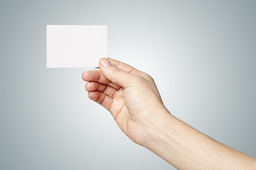 Fototapeta premium Woman hand holding a card