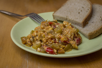 homemade lecho, hungaria tradition food with bread and spoon