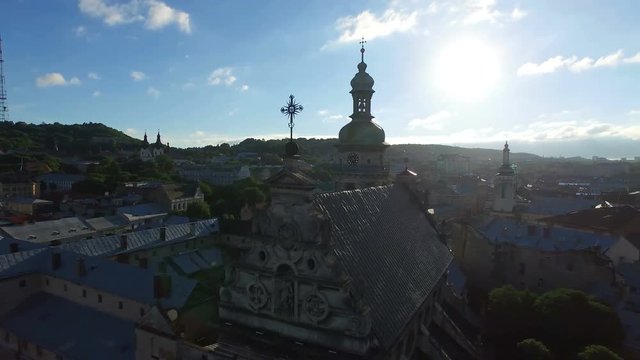 AERIAL flight around ancient church in Lviv. 4K.