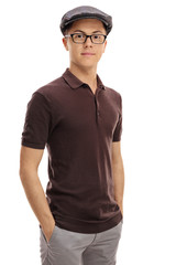 Teenage boy in a retro outfit looking at the camera