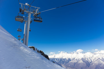 Scenery top view on winter mountains from ski resort Gorky Gorod