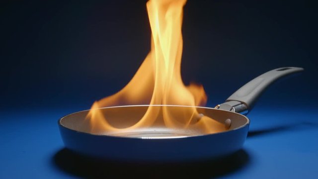 SLOW MOTION: Frying pan flaming