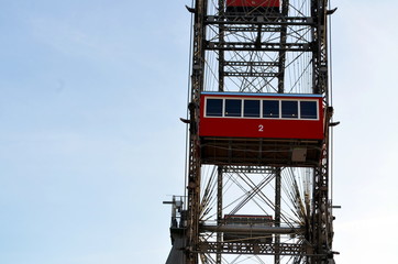 VIENNA, AUSTRIA - MARCH 18, 2016: The red cabin of oldest Ferris Wheel in Prater park on sky...