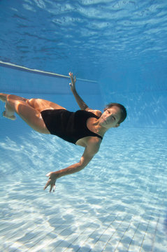 Female relaxing underwater