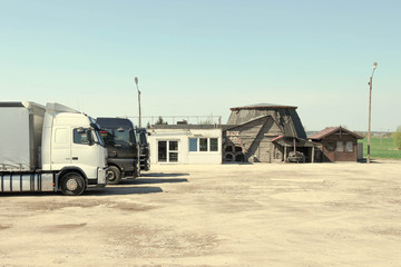 Roadside lorry / truck parking in sunshine