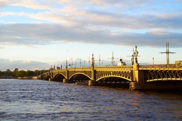 Fototapeta na wymiar Troitskiy bridge in St. Petersburg on sunset