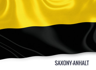 Naklejka premium Flag of German state Saxony-Anhalt waving on an isolated white background.