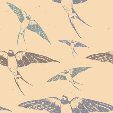 Hand drawn with ink pen pattern with colored swallow on beige background. Flying birds in the sky perfect for fabrics and textile or paper design. Trendy and fashion background.