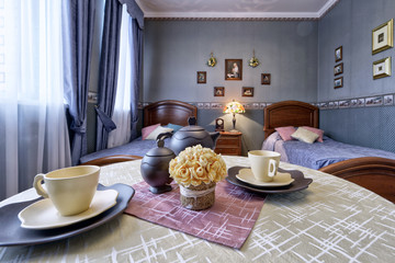 Classic bedroom interior in blue tones in a modern house.