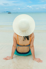 Fototapeta na wymiar Young woman relax on the beach
