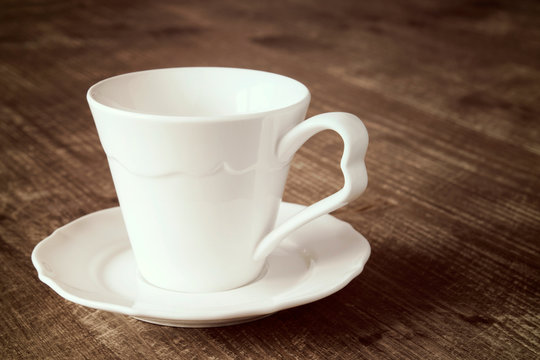Empty espresso cup with a saucer