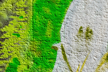 Abstract detail of wall with fragment of colorful graffiti. Urban Art closeup. Concept of Modern iconic urban culture youth. Aerosol design