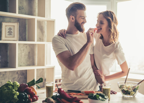 Couple cooking healthy food