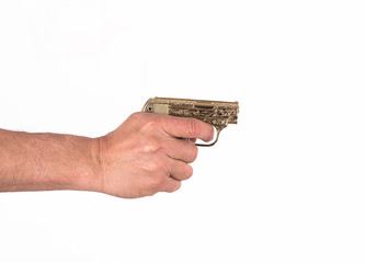 Hand with a gold gun