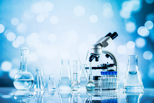 Science Concept. microscope with lab glassware, laboratory research and development 
