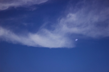 Obraz na płótnie Canvas Beautiful Sky with white moon and clouds
