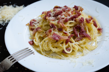 Pasta Carbonara. Spaghetti with bacon and parmesan cheese.